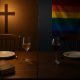 Molly McNearney politics dividing family over ideology and faith with Bible and cross on one side and gay pride flag on the other